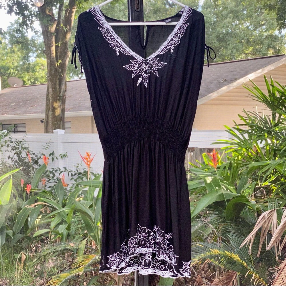 Beach cover up with adjustable sleeves!